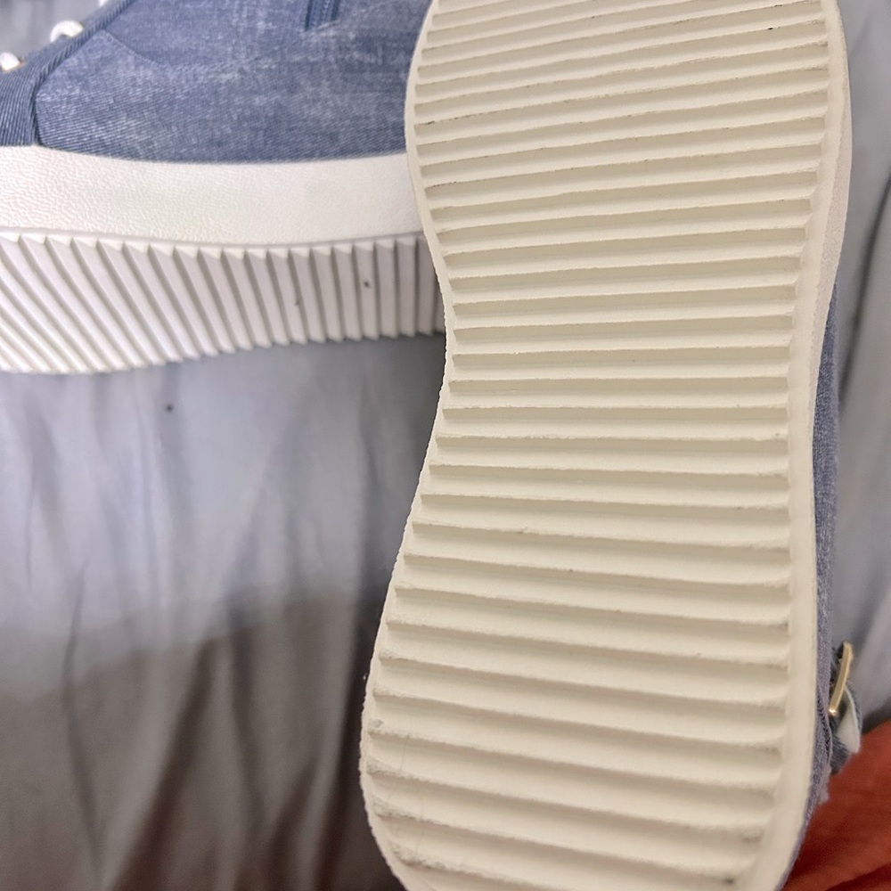 Only tried on once. Denim wedge sneakers.